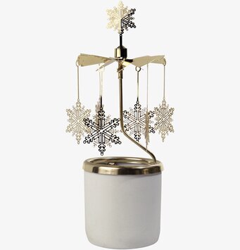 Bild av ljuslykta med snöflingor och roterande spel