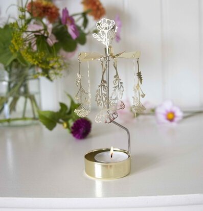 Änglaspel Flora från Pluto Produkter med blommotiv och ljus